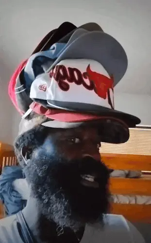 Xisx31 Man with Many Caps