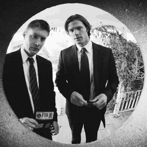 Two FBI Agents Showing Badges