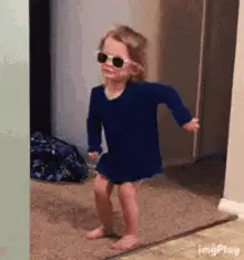 Little Girl Dancing Happy Dance in Sunglasses