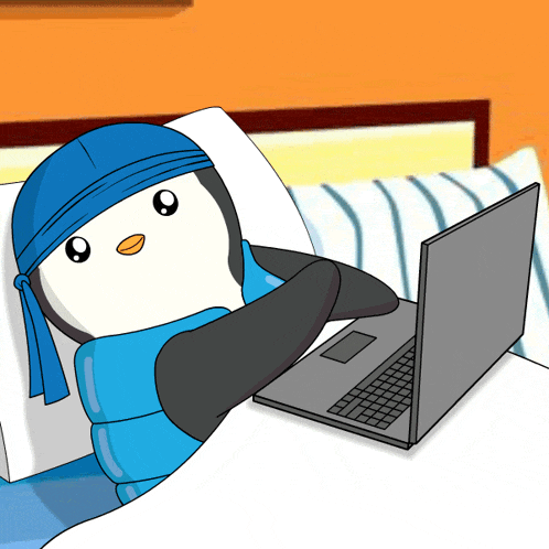 Pudgy Penguin Typing on Laptop