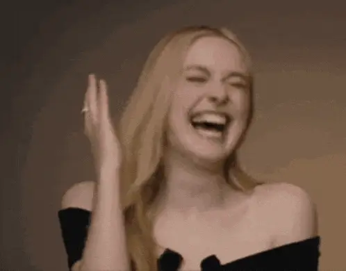 Dakota Fanning's Hilarious Laugh Reaction – free GIF download