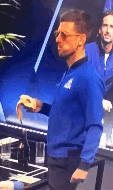Novak Djokovic Eats Banana & Makes Shaka Sign