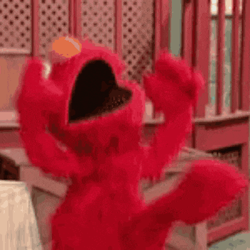 Elmo Dancing Joyfully