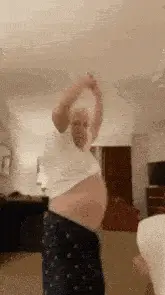 Man Dancing with Exposed Belly