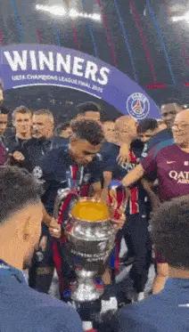 PSG's Desire Doué Lifts Champions League Trophy