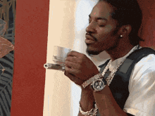 Andre 3000's Spill App Tea Moment