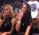 Shensch: Man Blows Kiss Behind Women