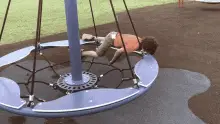 Bored Kid on Merry-Go-Round