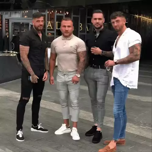 4 Blokes Posing Outdoors