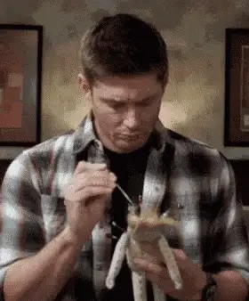 Jensen Ackles as Dean Winchester with Voodoo Doll