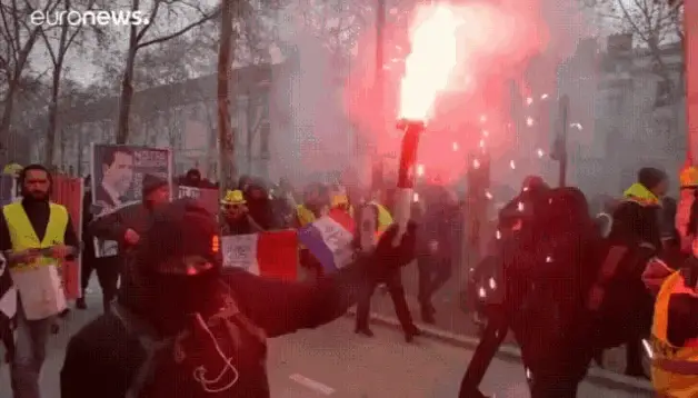Gilets Jaunes Protest with Red Flare