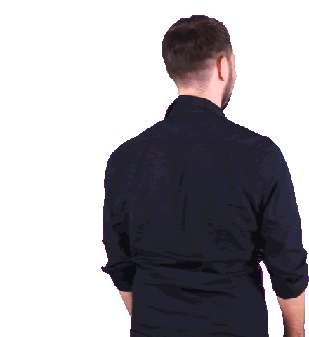 Smiling Bearded Man Turns, Crosses Arms