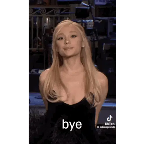 Ariana Grande Says Bye on Stage in Black Dress