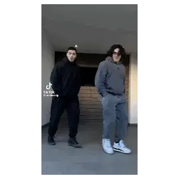 Carlos Belcast & Friend Dancing in Sync
