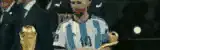 Lionel Messi Lifts World Cup Trophy