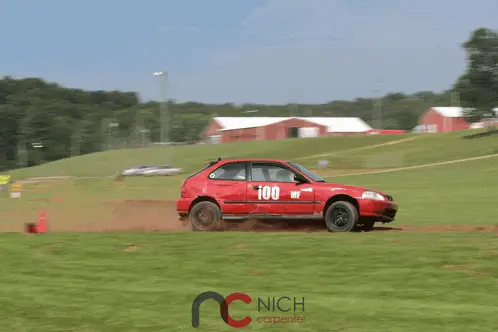 Red Rally Car Racing and Speeding