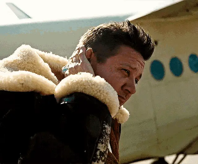 Jeremy Renner in Sheepskin Jacket by Plane