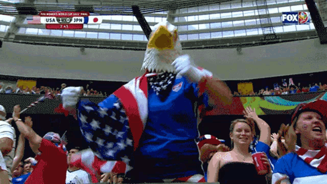 USA Soccer Fan Cheers with Eagle Mascot
