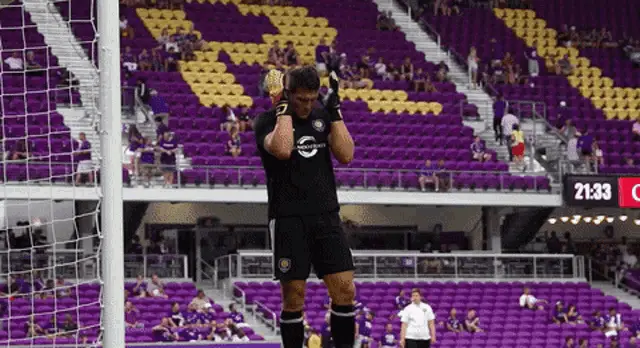 Orlando City SC Goalie Patting Head in Stadium