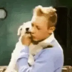 Tintin (Jean Pierre Talbot) and Milou.Aww, cuties! :3