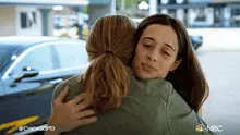 Hugging Kim Burgess