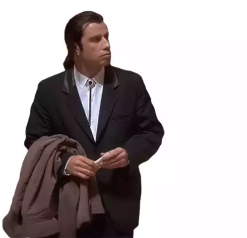 John Travolta Waiting and Looking Around