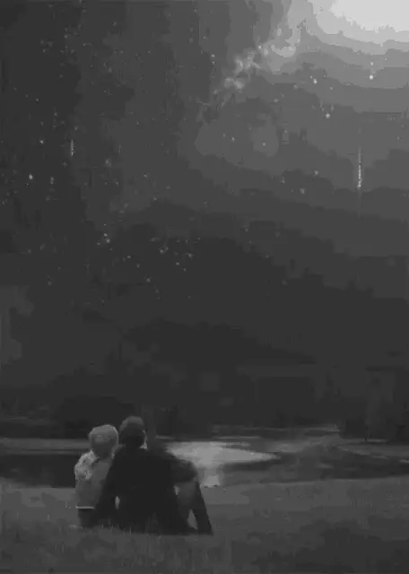 Romantic Couple Stargazing Under Night Sky