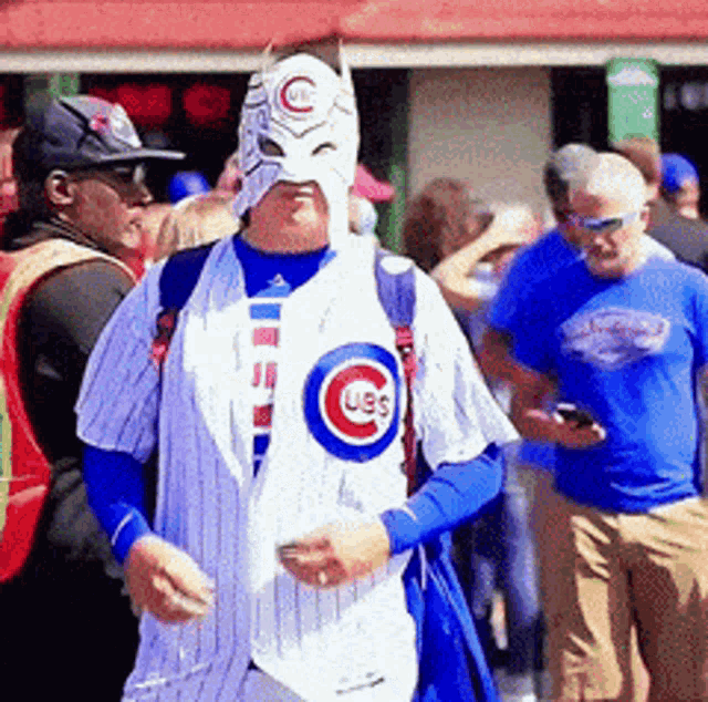 Masked Chicago Cubs Fan Reveals Jersey
