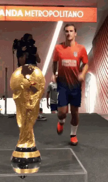 Antoine Griezmann with World Cup Trophy