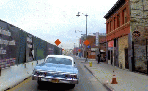 Classic Blue Car Driving By in New York
