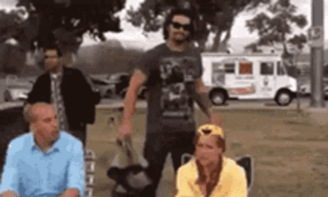 Hold On Wait: Man Struggles with Portable Chair
