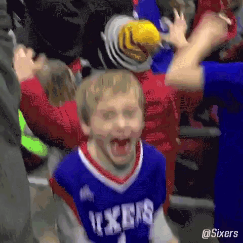 Excited Young Fan at Philadelphia 76ers Game