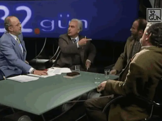 Dogu Perincek in Heated Debate, Pointing Finger