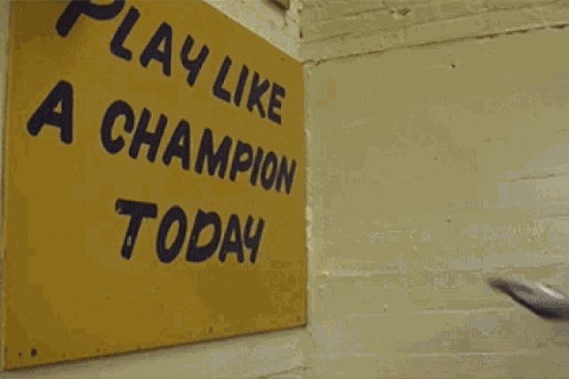 Notre Dame Football Player Touches Champion Sign
