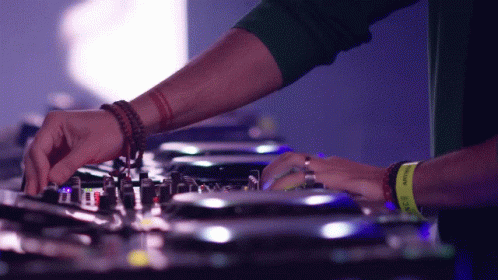 DJ Mixing Music on Turntables