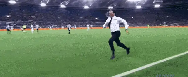 Simone Inzaghi Runs on Soccer Field