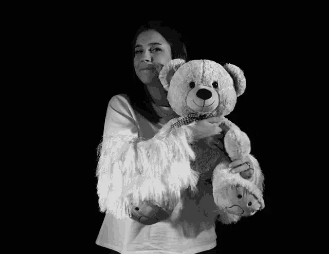 Marina Luque Hugs Toby the Teddy Bear