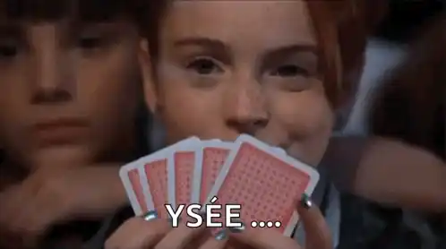 Girl's Poker Face with Cards