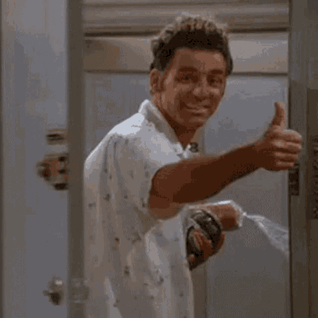 Kramer Seinfeld: Thumbs Up & Spray Bottle