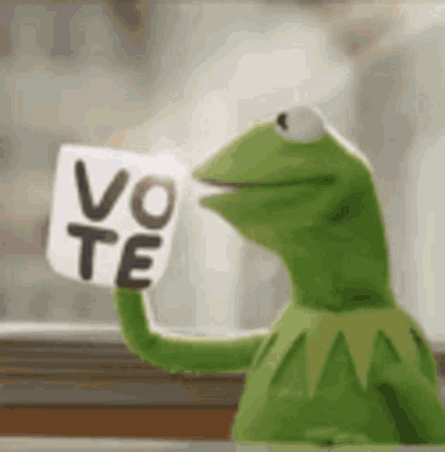 Kermit the Frog Holds 'Vote' Mug