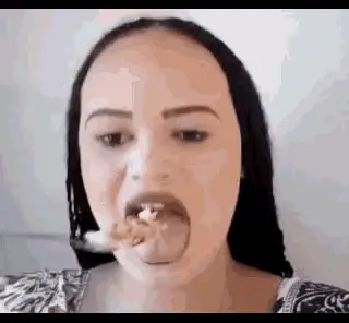 Bianca Alves Eating with Spoon