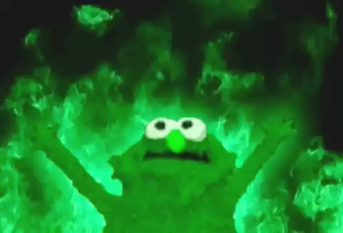 Elmo Fire: Green Elmo in Flames