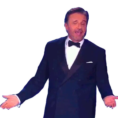 Christian De Sica: Welcoming Gesture in Tuxedo