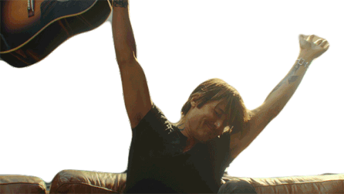 Keith Urban Hands Up Celebrating with Guitar
