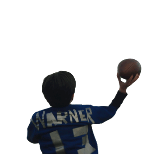 Young Kurt Warner Throwing a Football