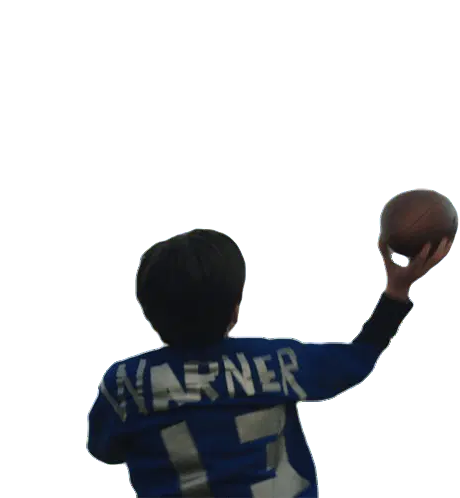 Young Kurt Warner Throwing a Football