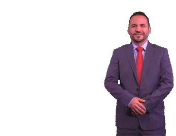 Ismael Cabrera pointing at Premier Centro Medico