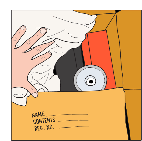 Hand Storing Memories in a Box Labeled Maro