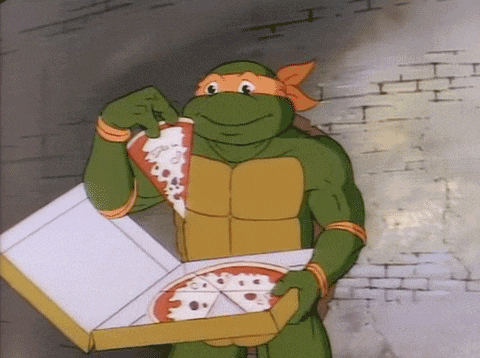 TMNT Michelangelo Enjoys Pizza