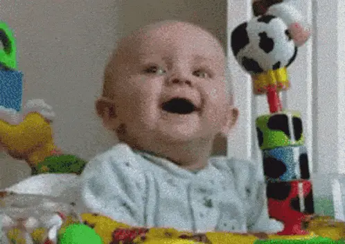 Happy Baby Playing in Bouncer – baby memes meme GIF free download no watermark 2026